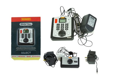 Lot 391 - Hornby Digital Select Controller and three other powerpack / controllers.