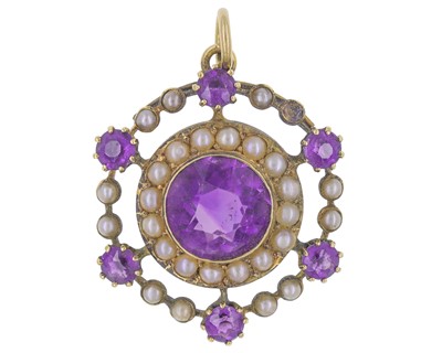 Lot 132 - A 15k gold, amethyst, and seed pearl pendant by Murrle Bennett and Co.