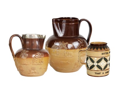 Lot 442 - Royal Doulton stoneware, three jugs.