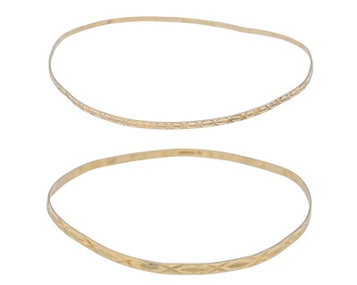 Lot 139 - Two 9k gold bangles.