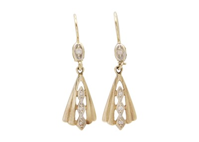 Lot 131 - A pair of higher-purity gold and CZ set fan pendant earrings.