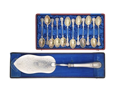 Lot 250 - A cased Christofle 19th-century French silver-plated set of 12 teaspoons and a cased fish slice.