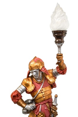 Lot 49 - A large plaster floor lamp, modelled as a figure of a warrior.