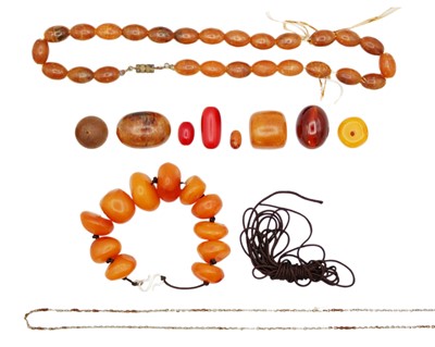 Lot 54 - An assortment of loose beads.