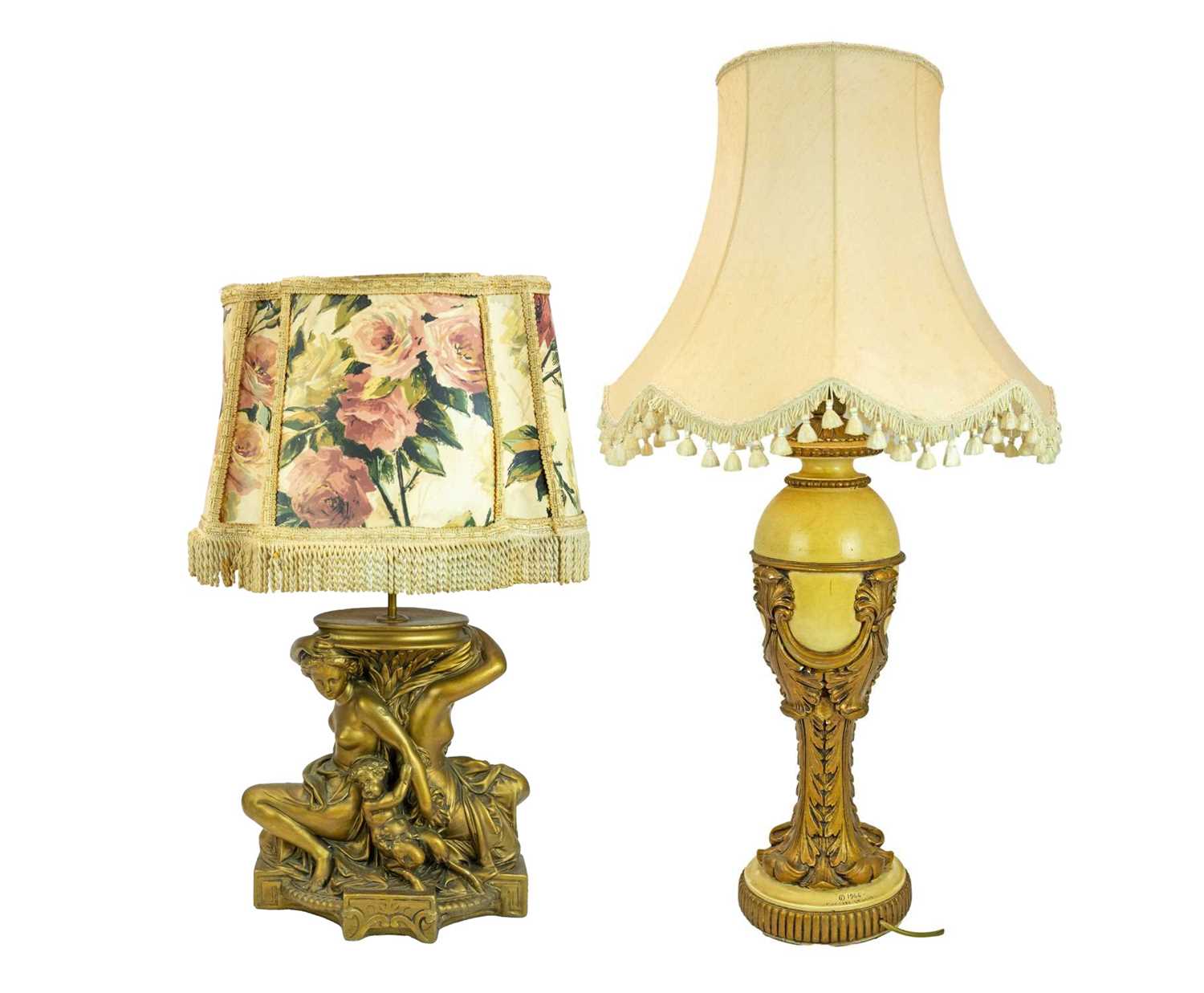 Lot 83 - A gilt and cream painted plaster table lamp.