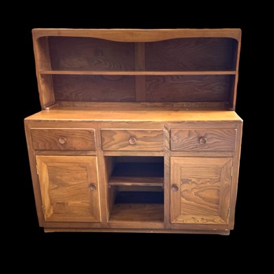 Lot 9 - A mid-century oak sideboard bookcase with...