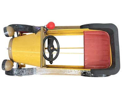 Lot 379 - A vintage official Brum toy peddle car.