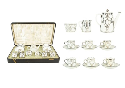 Lot 416 - A Paragon China silver overlaid coffee set, cased.