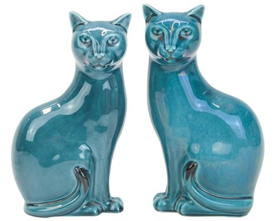 Lot 713 - A pair of mid century Poole pottery cats.