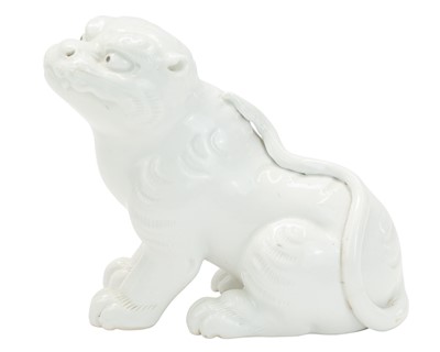 Lot 597 - A Japanese Hirado figure of a tiger.