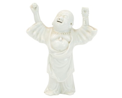 Lot 517 - A Chinese blanc de Chine figure of the laughing Buddha.