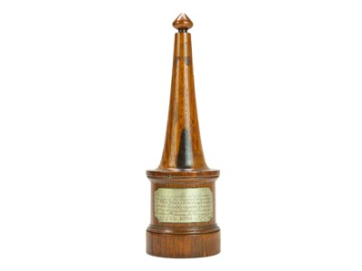 Lot 19 - A carved oak desk ornament.