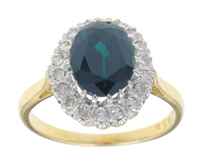 Lot 146 - An 18k gold teal 2.20ct sapphire and diamond halo ring.