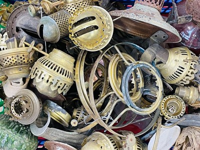 Lot 122 - A box of oil lamp parts and fittings.