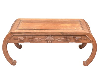 Lot 573 - A Chinese hardwood kang table.