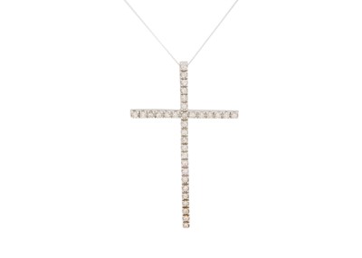 Lot 159 - A 14k white gold diamond set cross pendant on a fine 9k white gold curb chain.