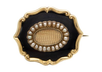 Lot 160 - A Victorian gold and seed pearl mourning brooch.