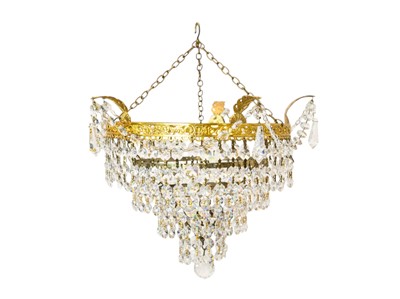 Lot 817 - A gilt four tier waterfall chandelier.