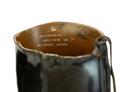 Lot 31 - A pair of black leather riding boots and trees.