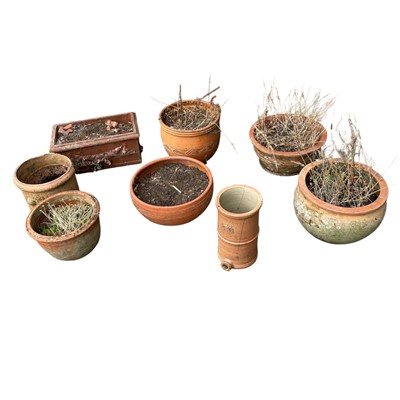 Lot 21 - Eight Terracotta Planters. The largest...