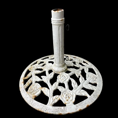 Lot 23 - A Cast Iron parasol base. 60cm across with a...