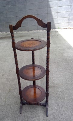 Lot 64 - An Oak What-not. The height is 91cm tall and...