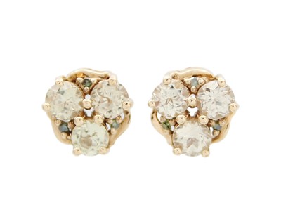 Lot 29 - A pair of 9k gold, csarite (Turkish diaspore), and tsavorite garnet stud earrings.