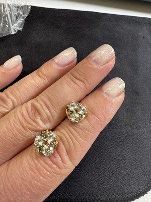 Lot 29 - A pair of 9k gold, csarite (Turkish diaspore), and tsavorite garnet stud earrings.