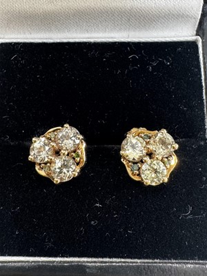Lot 29 - A pair of 9k gold, csarite (Turkish diaspore), and tsavorite garnet stud earrings.