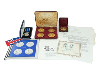 Lot 266A - A cased set of four Churchill medallions, gold-plated on sterling silver.