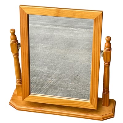 Lot 59 - A pine dressing table mirrow. 50 x 50cm.