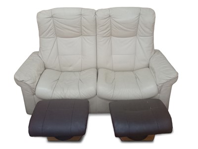 Lot 390 - A Stress-Less Two Seater Reclining Leather Sofa