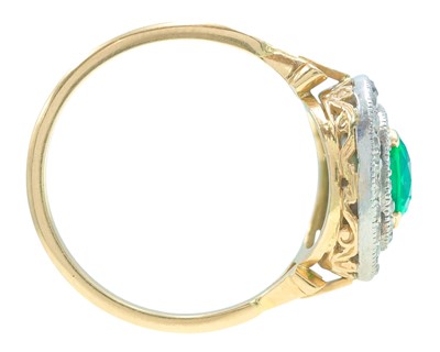 Lot 175 - An exquisite 18k gold Colombian emerald (appraised) and diamond double row halo ring.