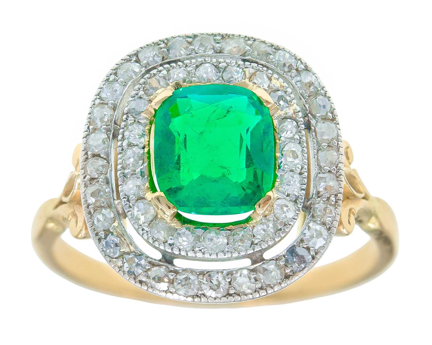 Lot 175 - An exquisite 18k gold Colombian emerald (appraised) and diamond double row halo ring.