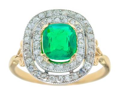 Lot 175 - An exquisite 18k gold Colombian emerald (appraised) and diamond double row halo ring.