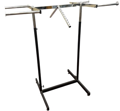 Lot 574 - A height adjustable clothes rail.