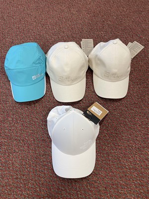 Lot 539 - Four Baseball Caps, Jack Wolfskin & North Face.