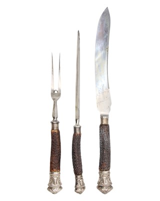 Lot 149 - A Victorian oak cased silver-mounted antler handle carving set by Harrison Brothers & Howson.