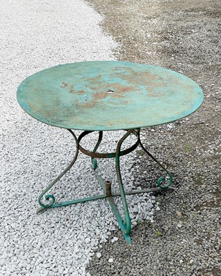 Lot 781 - A green painted metal garden table with circular top, 20th century.