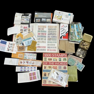 Lot 76 - A collection of stamps and postcards,...