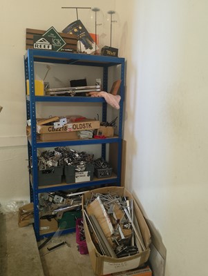 Lot 603 - A shelving unit and Metal Hanging Poles