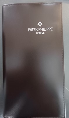 Lot 217 - PATEK PHILIPPE - A rare and desirable Aquanaut stainless steel gentleman's automatic wristwatch.
