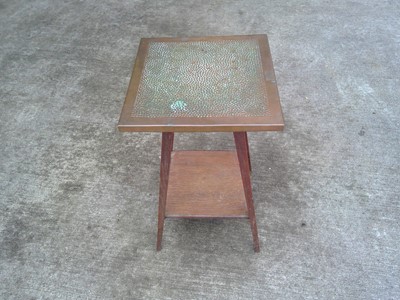 Lot 17 - A Jardiniere Stand with a Hammered Copper Top....