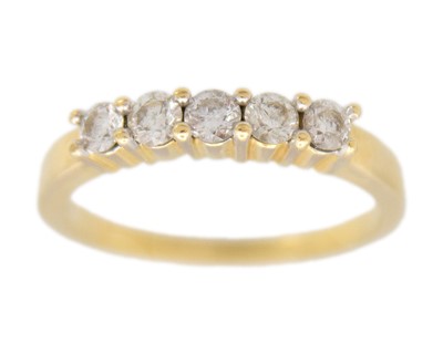 Lot 109 - An 18k five-stone diamond ring.
