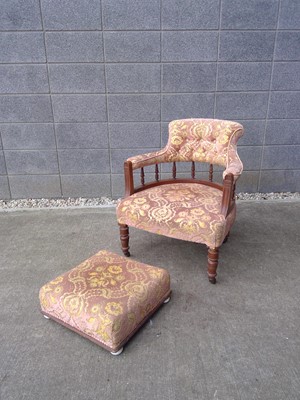 Lot 28 - An Upholstered Low Back Chair on Castors with...
