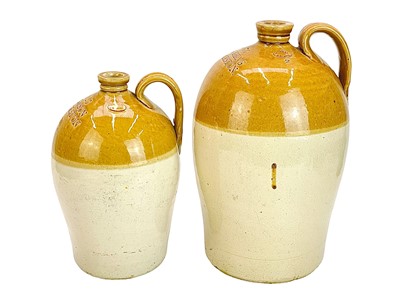 Lot 420 - Two Ching & Son Launceston stoneware flagons.