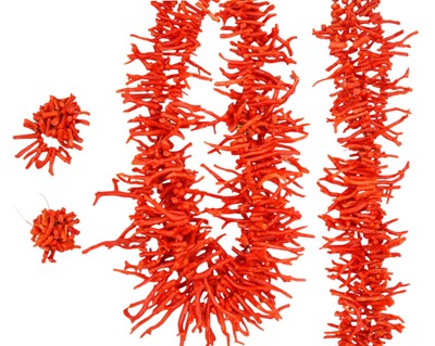 Lot 12 - A red coral necklace and matching bracelet, with a pair of clip-on earrings.