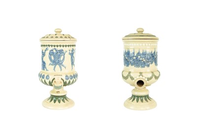 Lot 434 - Two Doulton Lambeth water filters and covers.
