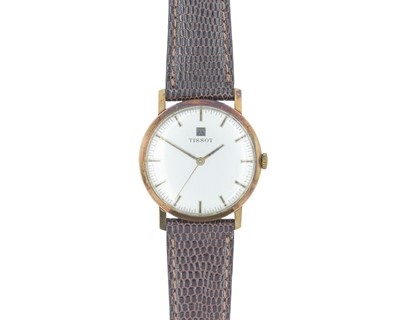 Lot 1064 - TISSOT - A 9ct cased gentleman's manual wind dress wristwatch.