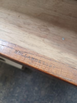 Lot 908 - A Holland & Sons oak writing or side table.
